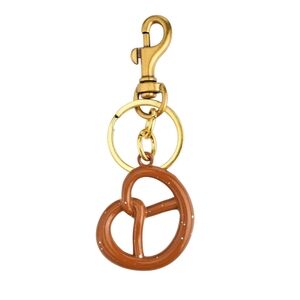 NWT Gold and Brown Pretzel Keychain Bag Charm